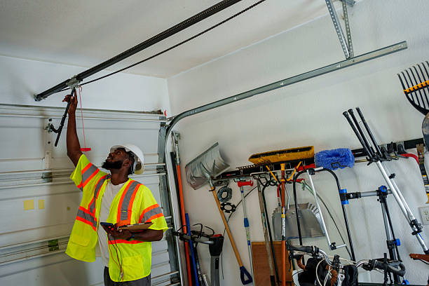 Professional Garage Door Installation technician working in Wellsville, KS